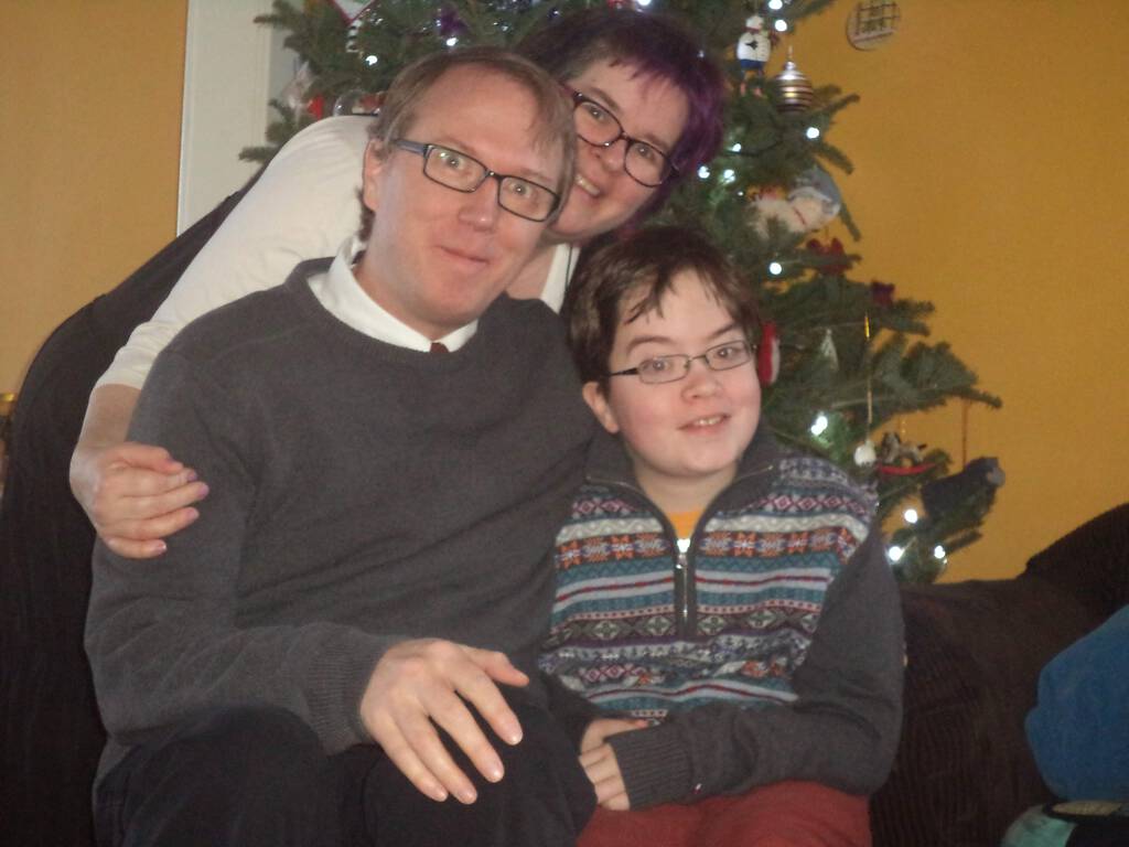 Our 2014 Family Christmas Photo, with me in grey sweater.