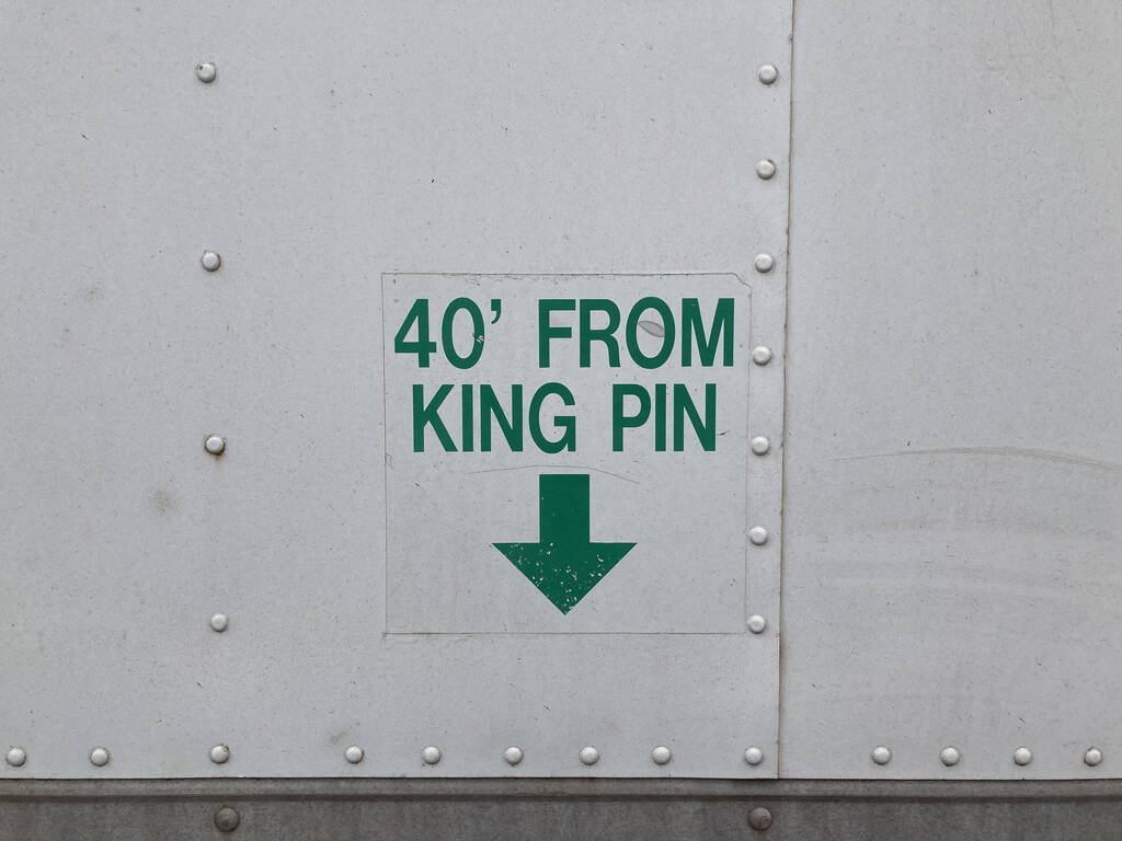 Photo of the sign on the side of a truck.