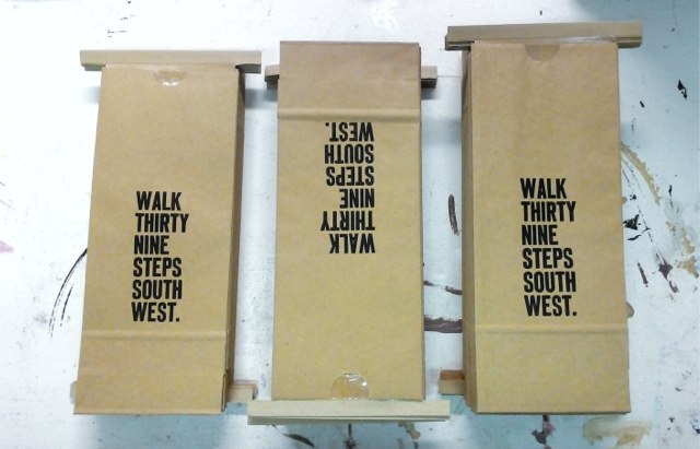 Walk Thirty Nine Steps South West (piles of printed coffee bags)