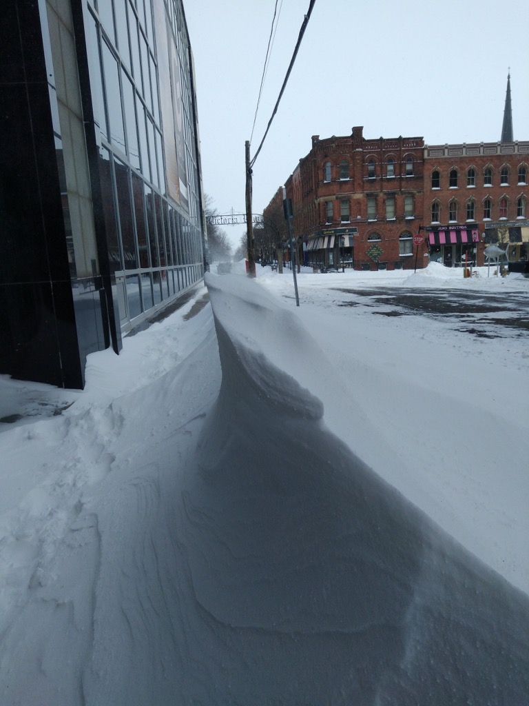 Photo of Richmond Street entrance to The Guild showing a pointy snow drift