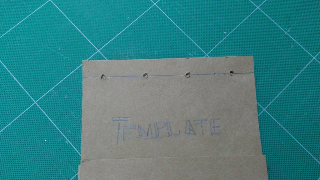 Photo of hole-punching template.