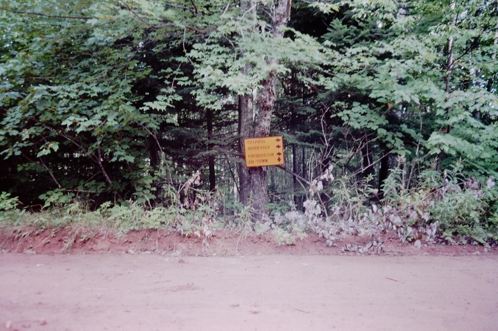 Red clay road street sign.