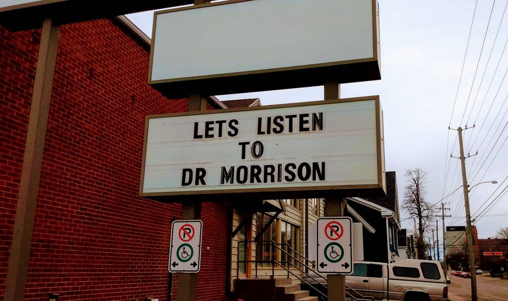 Sign at Maclauchlan's hotel "Lets Listen to Dr. Morrison"