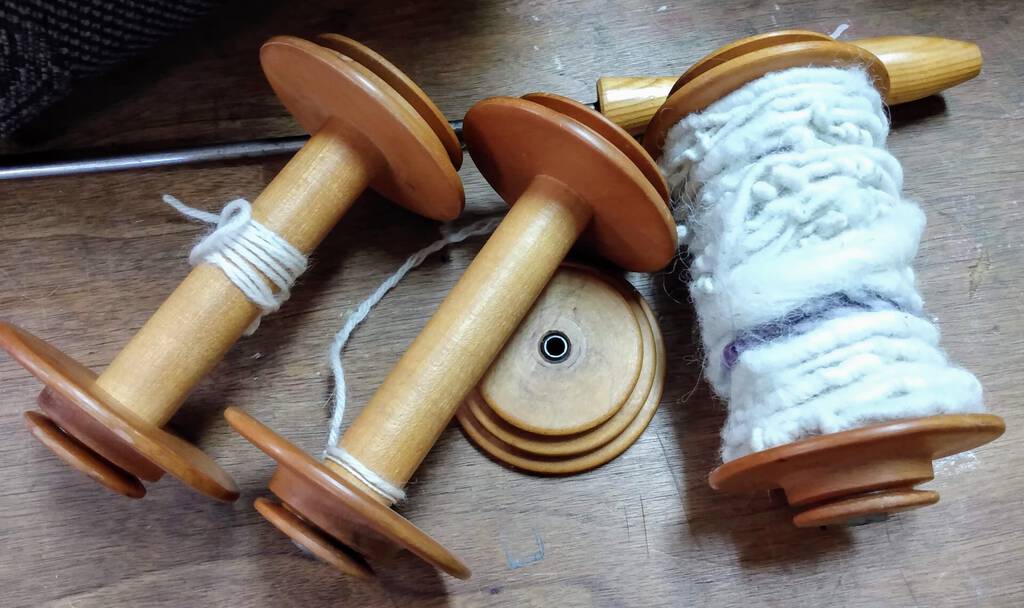 Spinning wheel bobbins