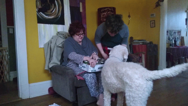 Animated GIF of Catherine, Ethan and Oliver on Christmas Morning