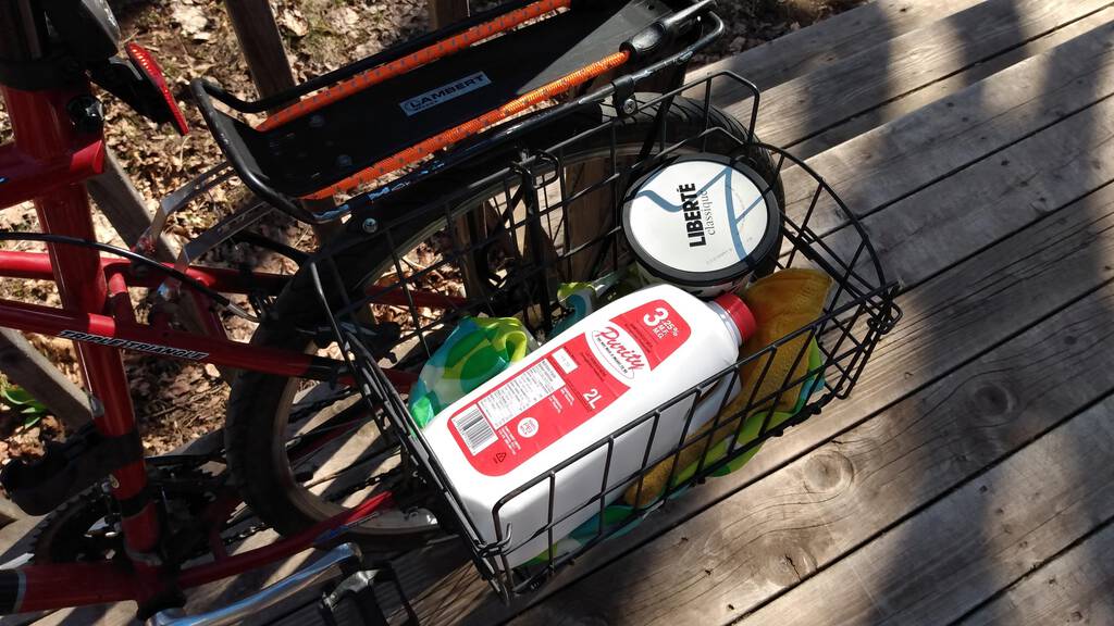 My bicycle rack with Purity Dairy milk and a tub of yogurt.