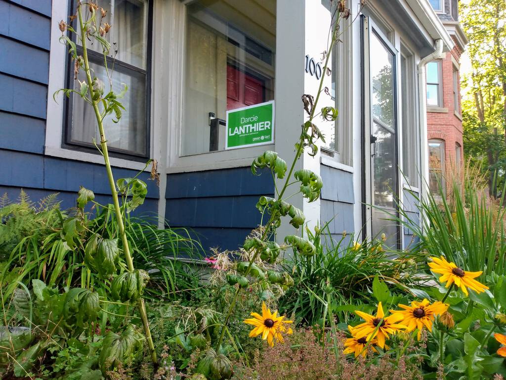 Darcie Lanthier campaign sign in our window.