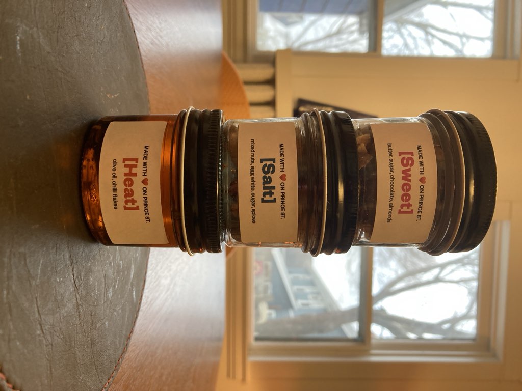Three jars, each with its own label--Hot, Sweet, Salt--stacked on top of each other.