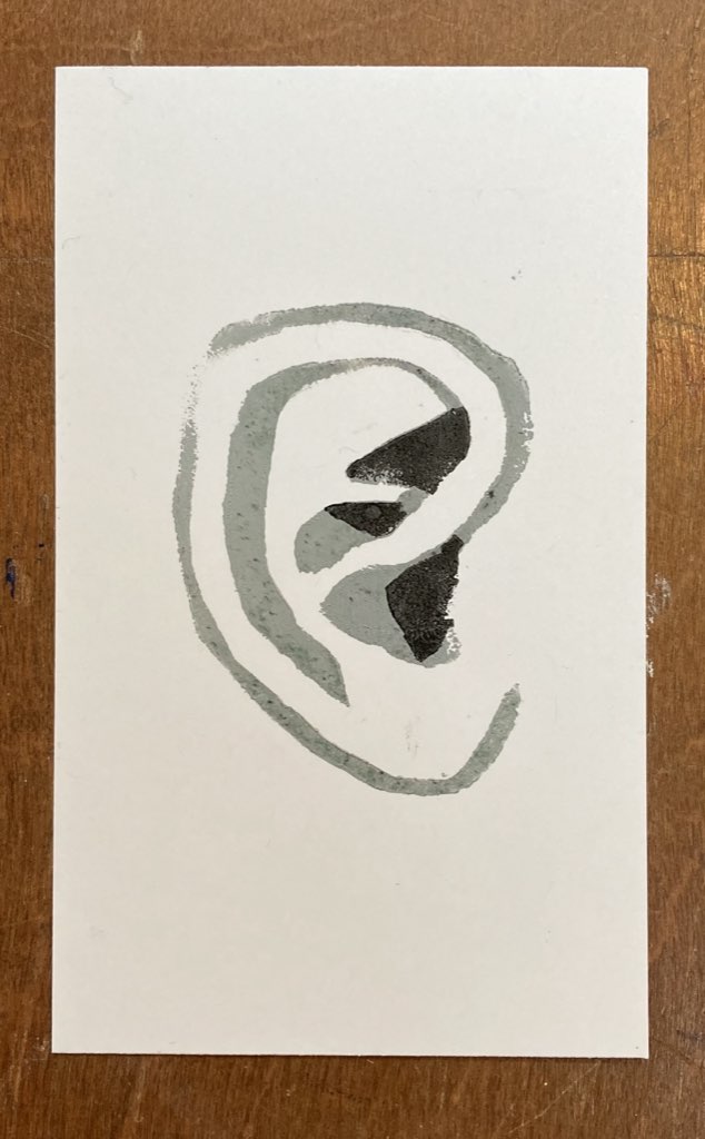 A lino reduction print of an ear.