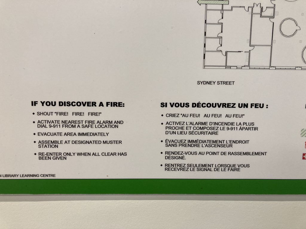 Instructions in the public library for what to do if you see fire
