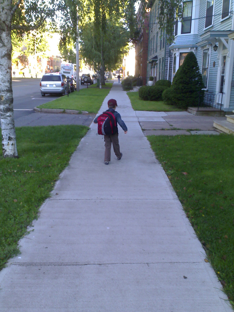 Olivia walking up Prince Street on the first day of grade one
