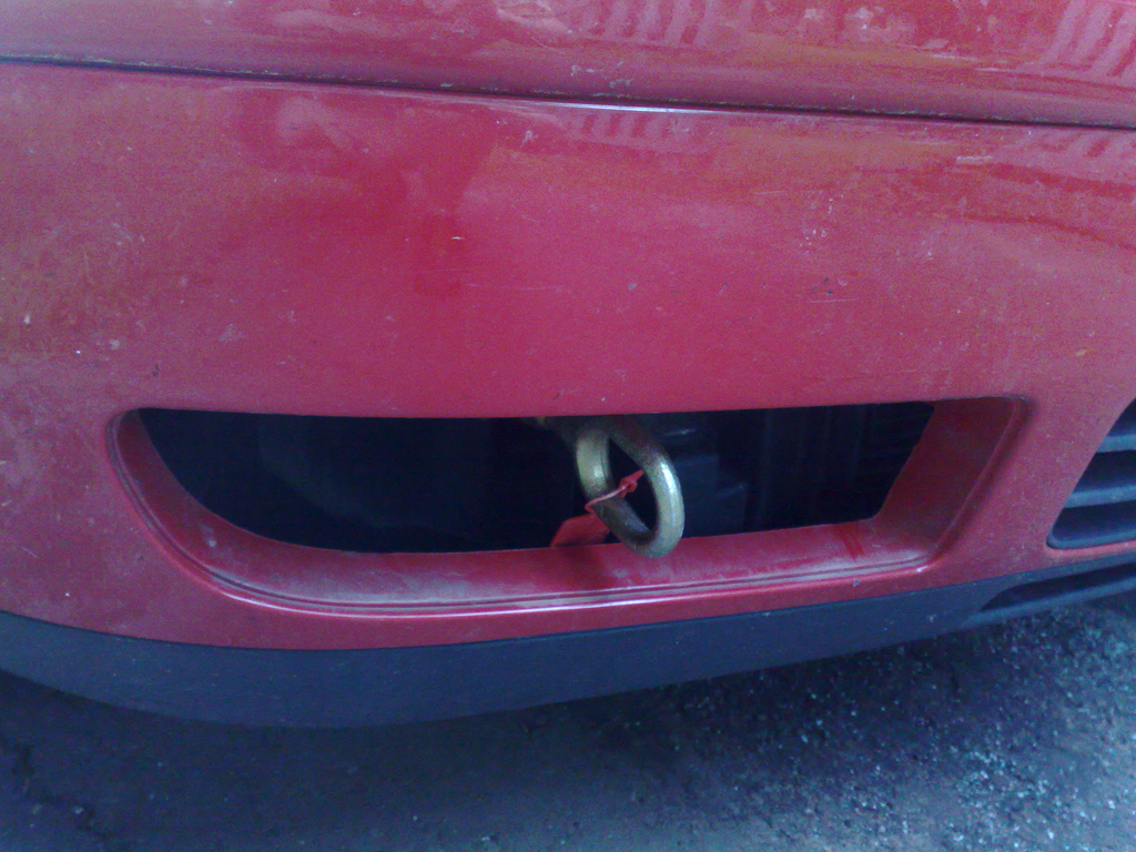 Screw the tow-hook into the hole