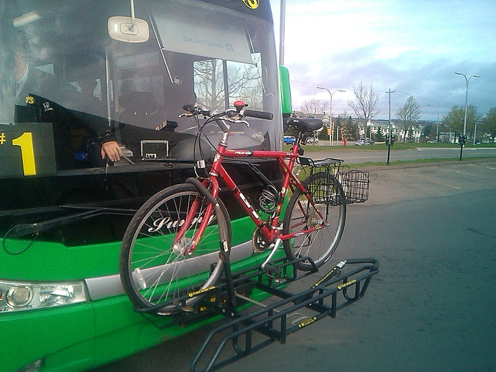 My bicycle in the bike rack on a T3 Transit bus.