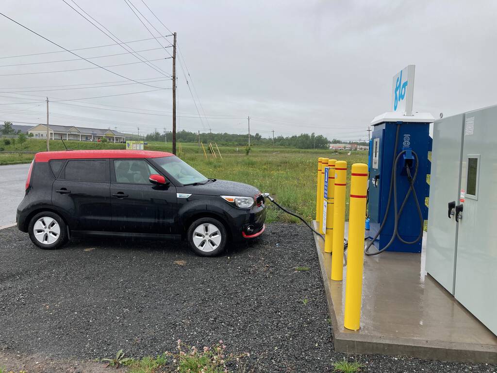 Our Kia Soul EV charging at the Flo charger in Stellarton, Nova Scotia on a rainy Monday.