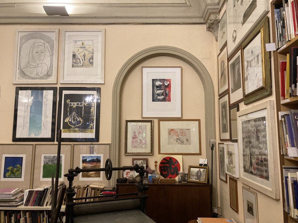 The wall of the Il Bisonte library, showing prints from many printmakers