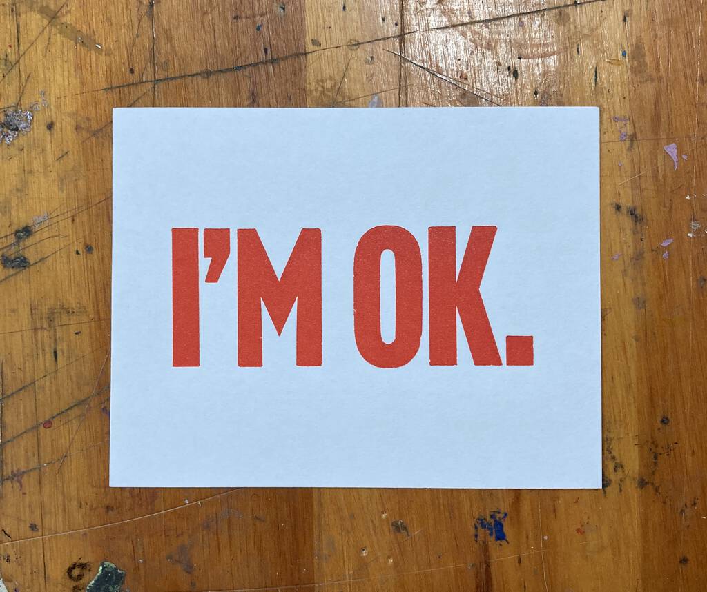 I'M OK, printed in declarative red.