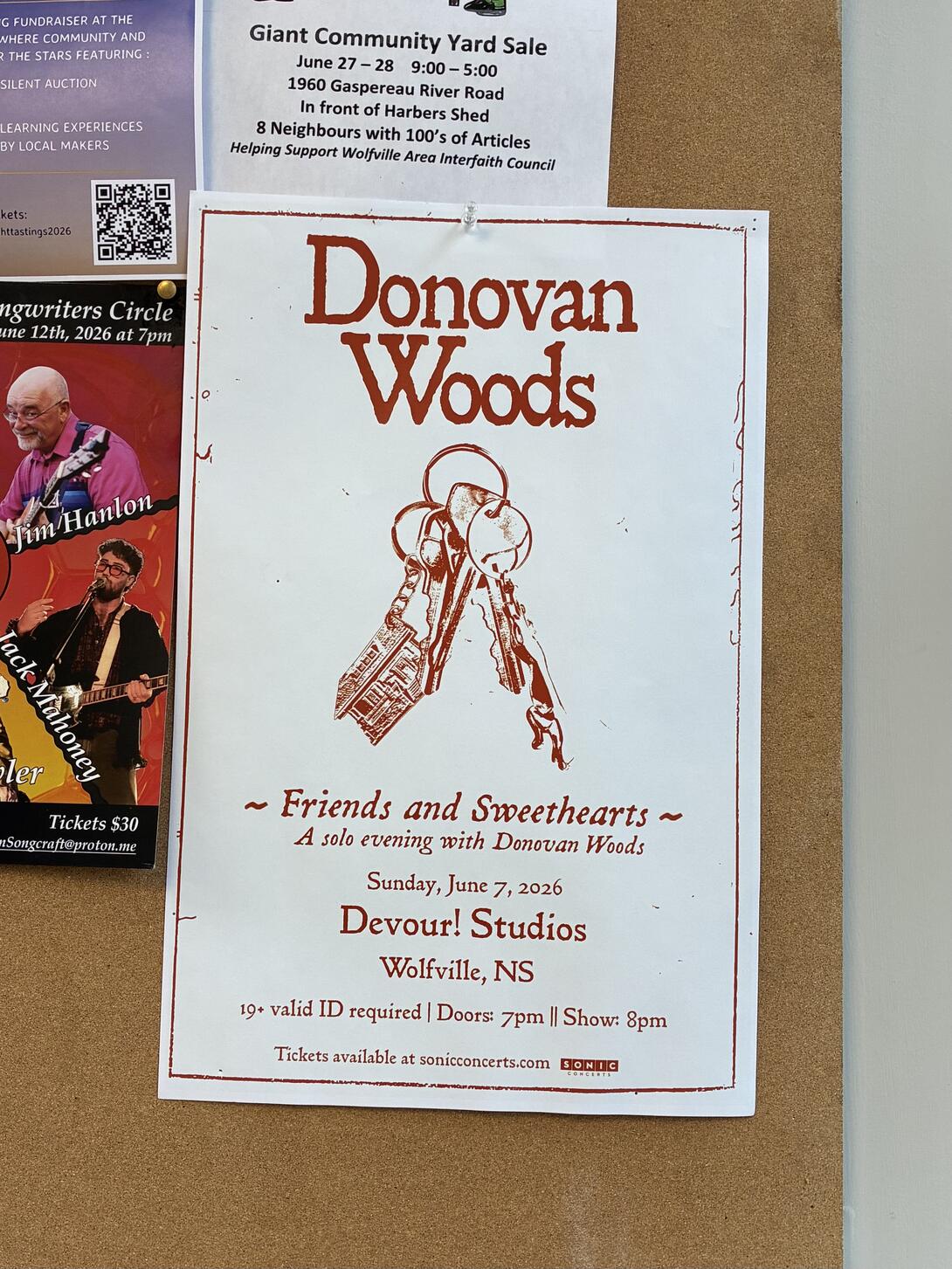 A poster advertising Donovan Woods in Wolfville. 