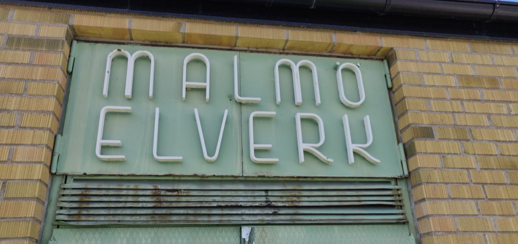 A sign on a building in Malmö, Sweden: art deco letters reading "Malmö Elverk"