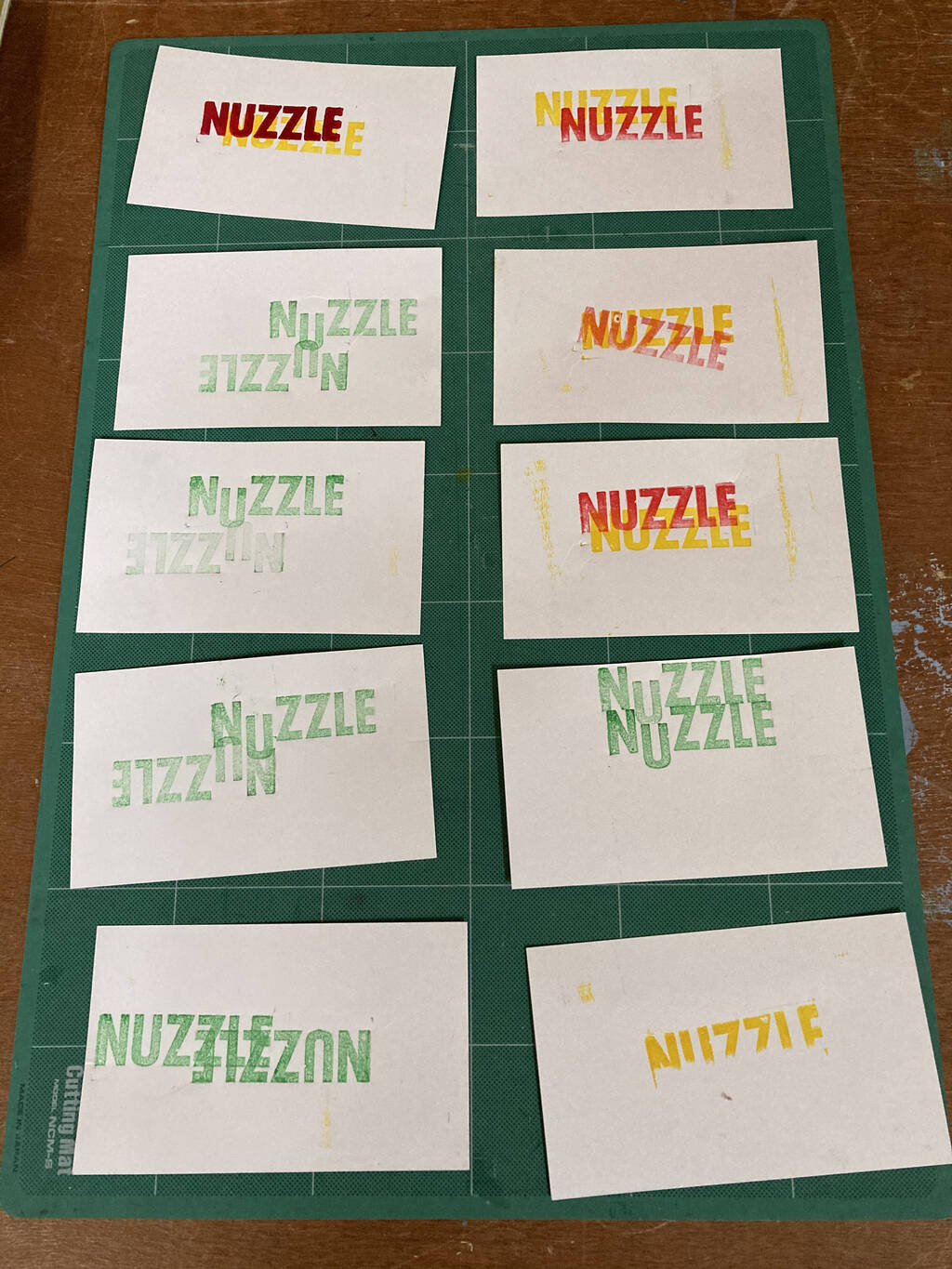 A collection of NUZZLE test prints.