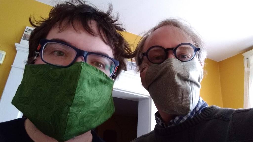 Oliver and Peter wearing non-surgical masks.