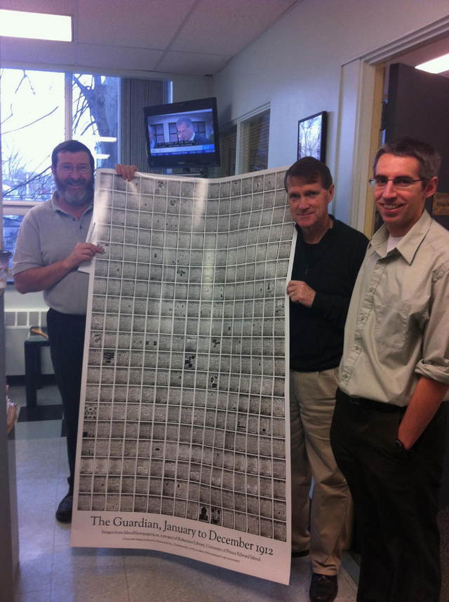 The Guardian Staff holding Guardian Poster