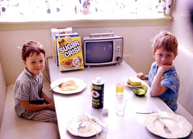 My brother Mike and I as kids, eating breakfast