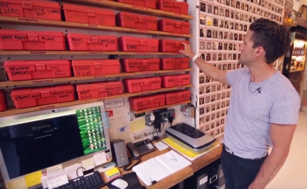 Still from a tour of Casey Neistat's studio showing labeled boxes