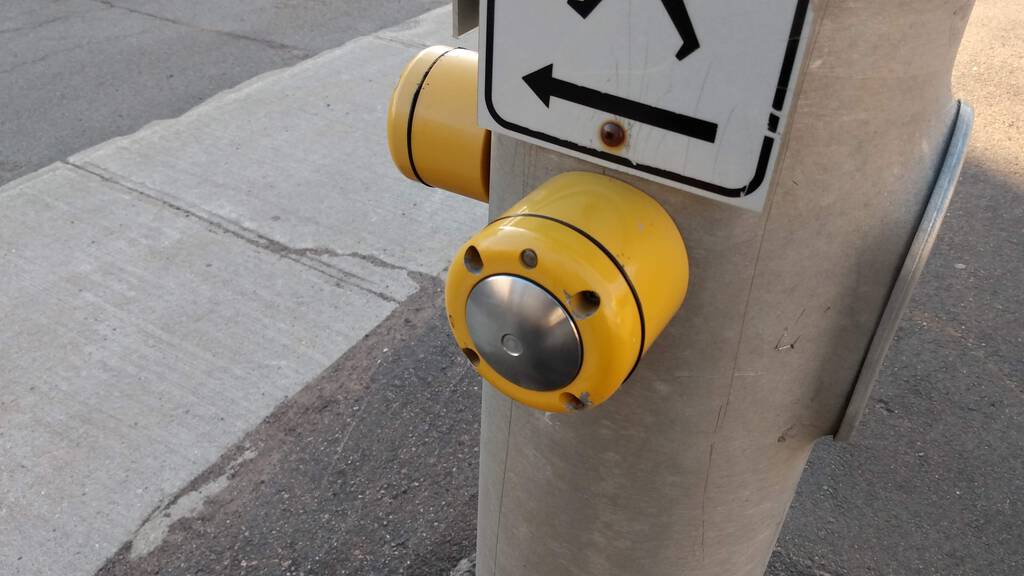 Older style pedestrian call button at Great George and Euston