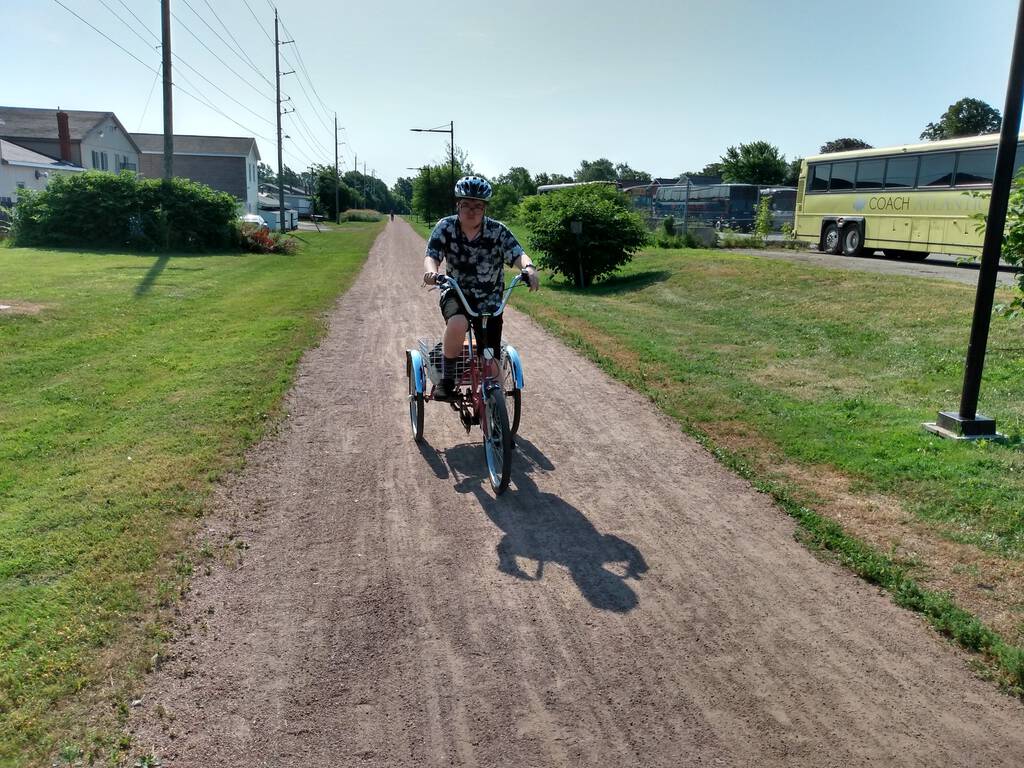 Photo of Oliver on his tricycle.