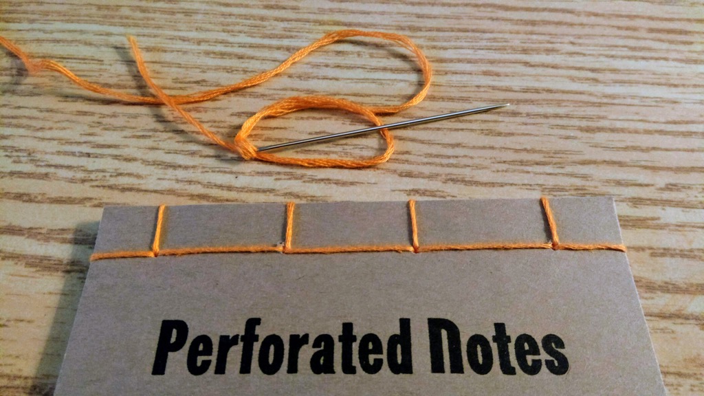 Photo of stab binding on Perforated Notes