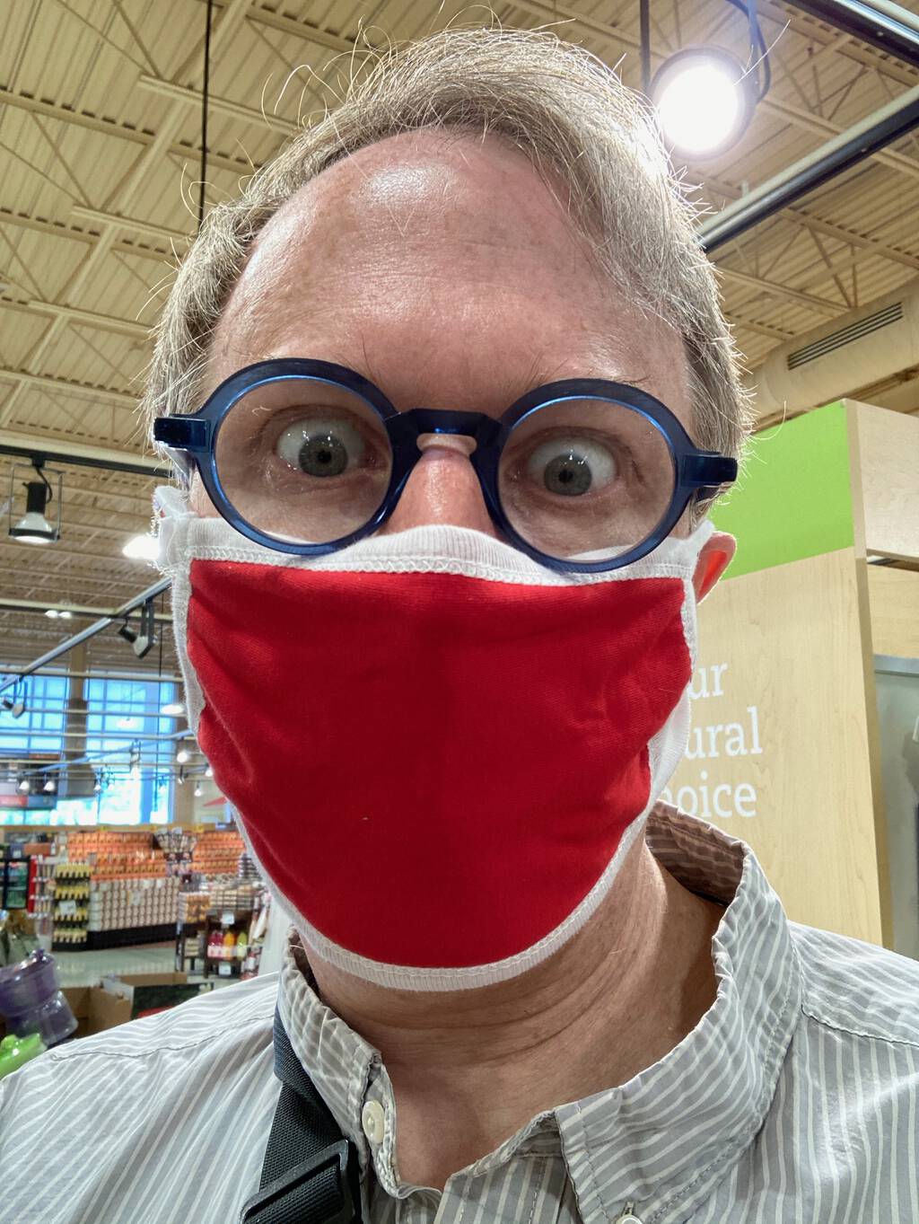 Photo of me wearing a red face mask, inside Sobeys.