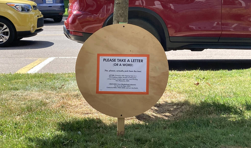 Round sign in front of our house.