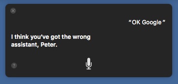 Screen shot of Siri telling me I have the wrong assistant when I say OK Google.