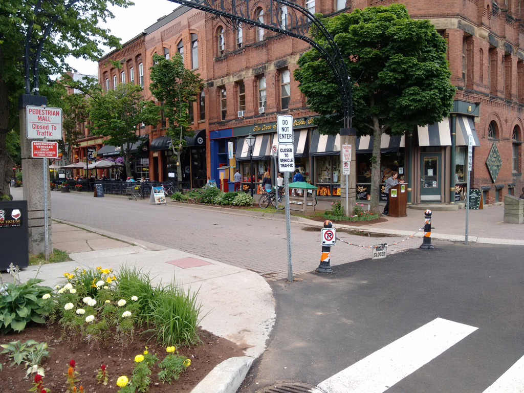 Photo of the many signs on the end of Victoria Row