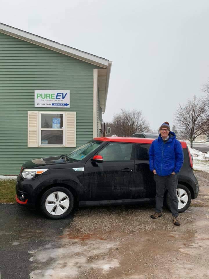 Me, standing in front of our new Kia Soul