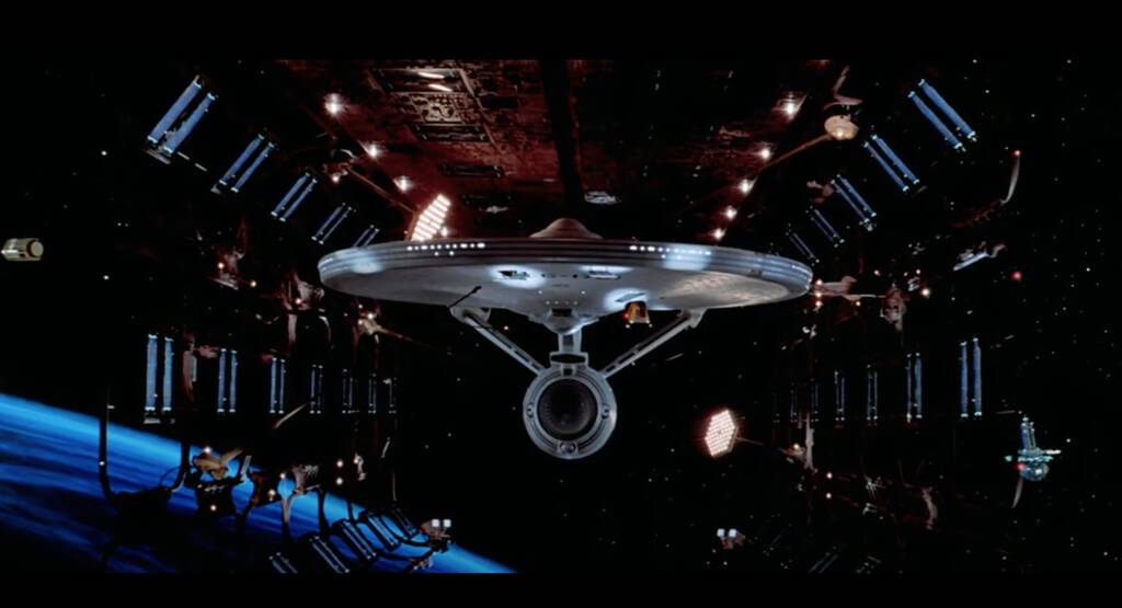 Still from Star Trek: The Motion Picture, showing the new Enterprise in dry dock from the front.