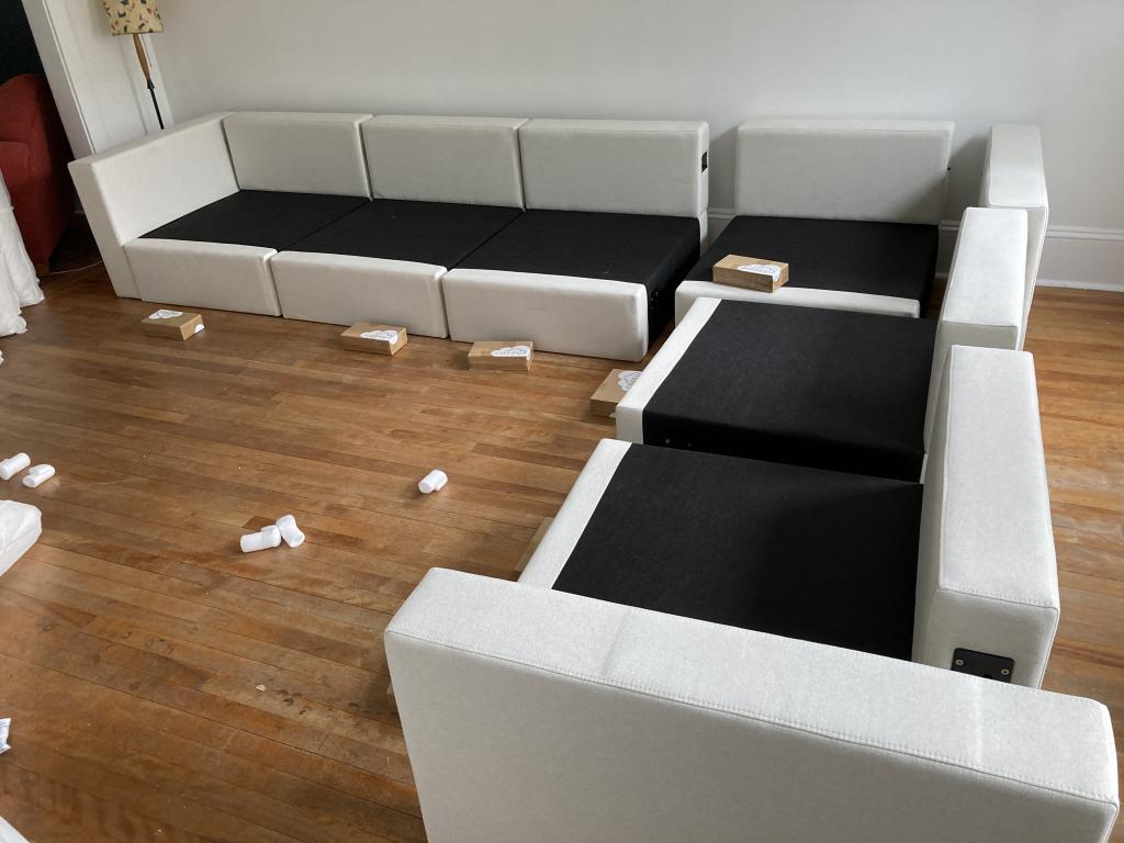 The half-assembled sectional, without cushions or the sections being joined together.