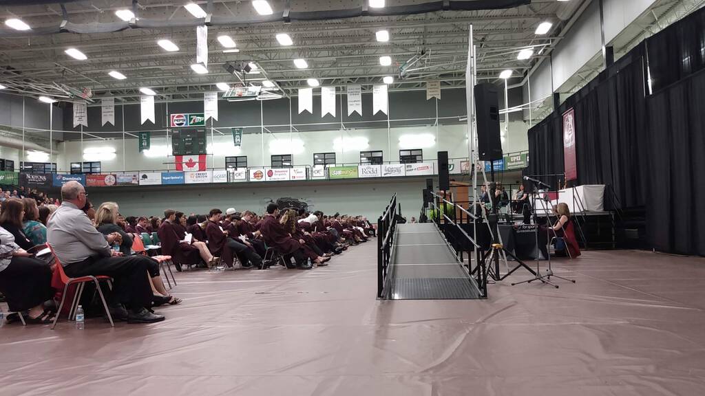 Our seats in the UPEI gym, close to the stage.