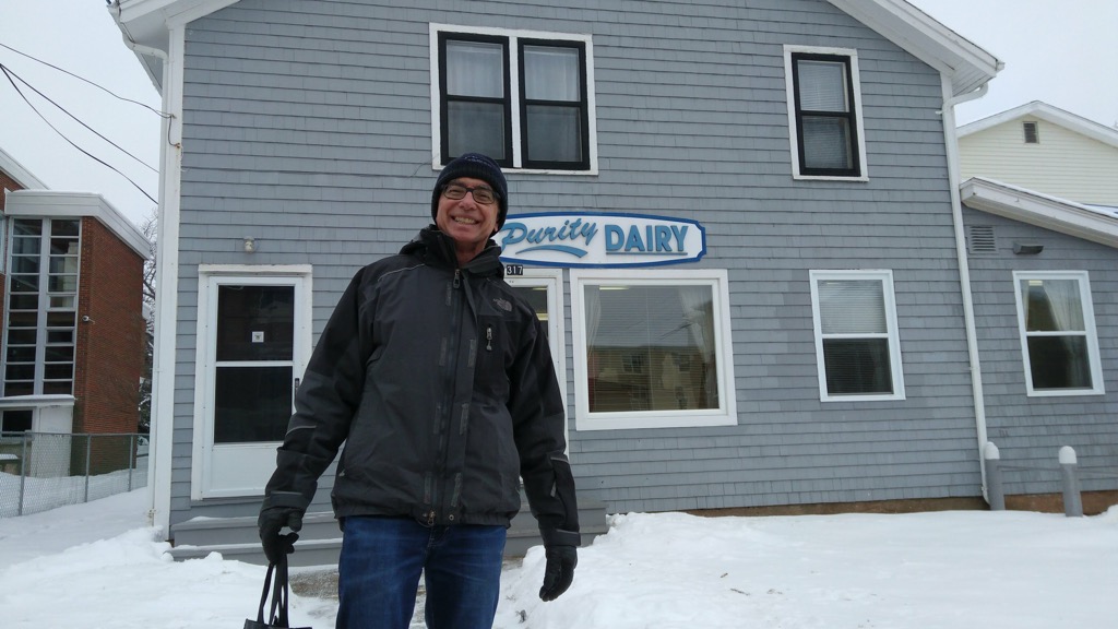 Photo of Tom Cullen in front of Purity Dairy