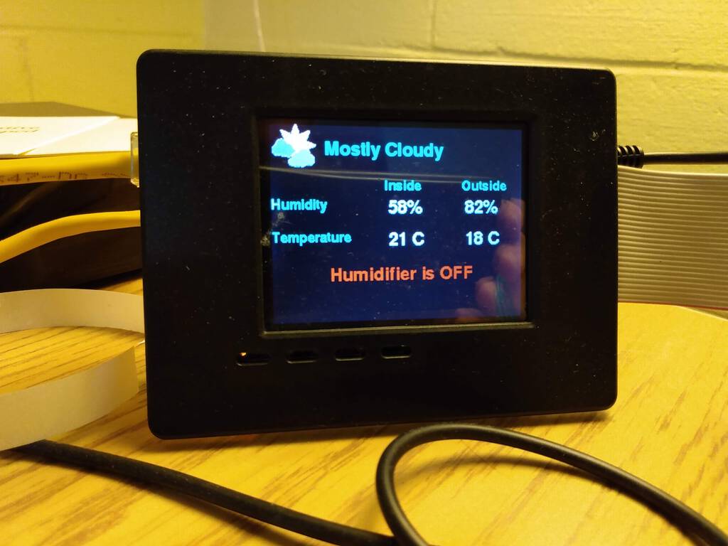 Temperature and Humidity display in my office showing warm day outside