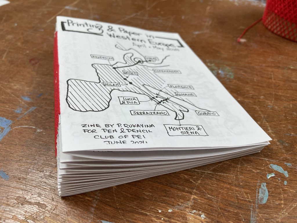 A photo of a stack of zines produced for tonight's meeting.